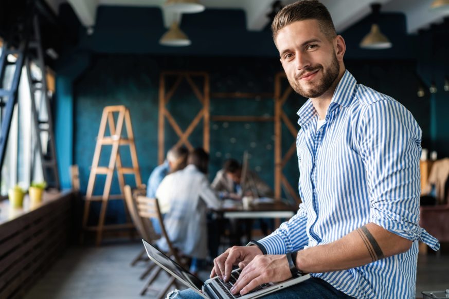 young man using a laptop